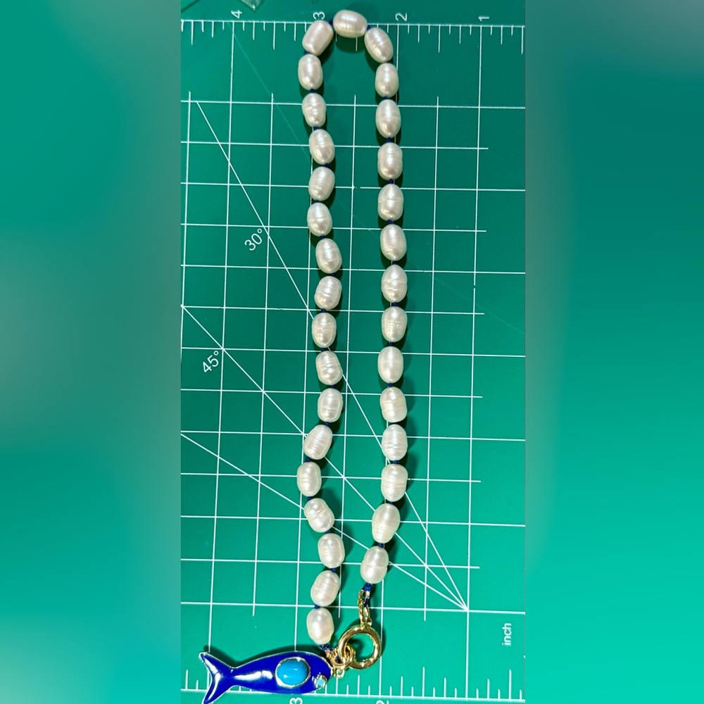 Elegant Pearl Necklace with Blue Fish Charm